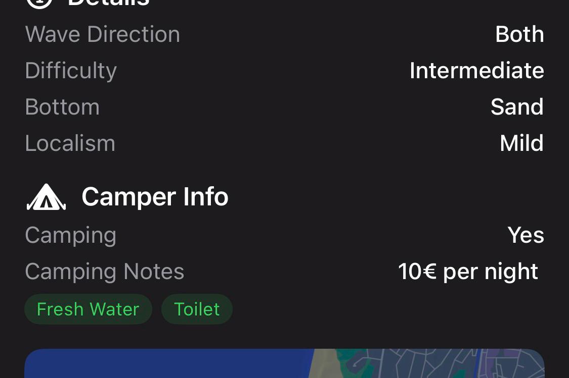 Swellbook spot detail showing Camper Info — camping allowed, fresh water, toilets